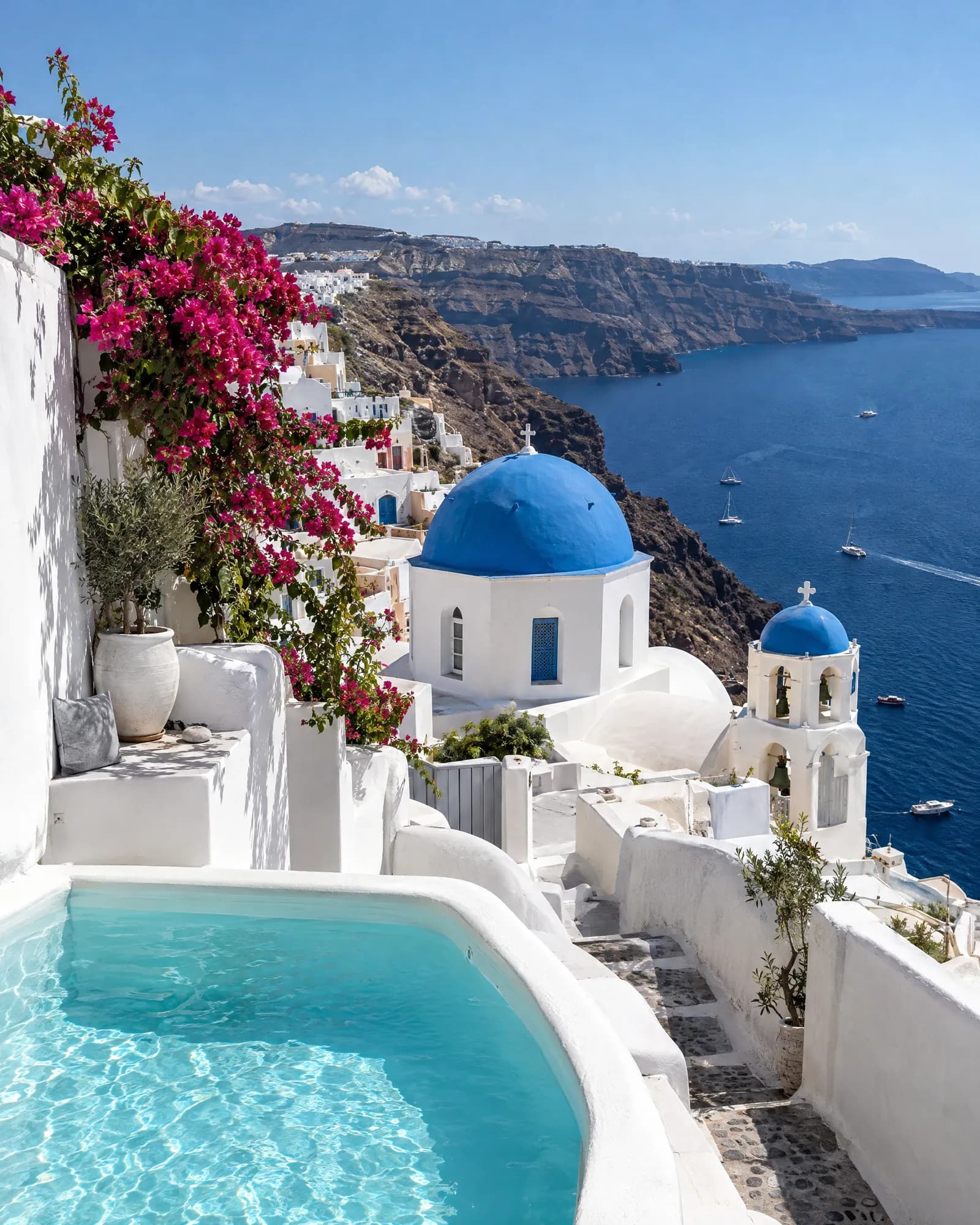 Plunge pool above the Santorini caldera on a sunny afternoon